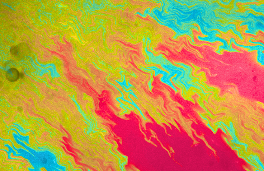 Abstract flows of red, orange, green, and blue