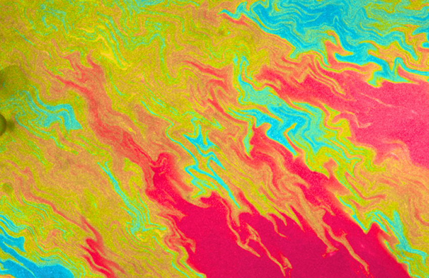 Abstract flows of red, orange, green, and blue