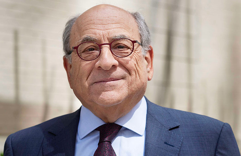 Portrait photo of Stuart Orkin smiling gently at the camera