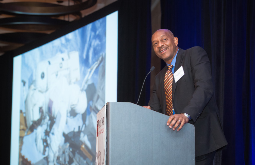 Robert Satcher speaking at podium