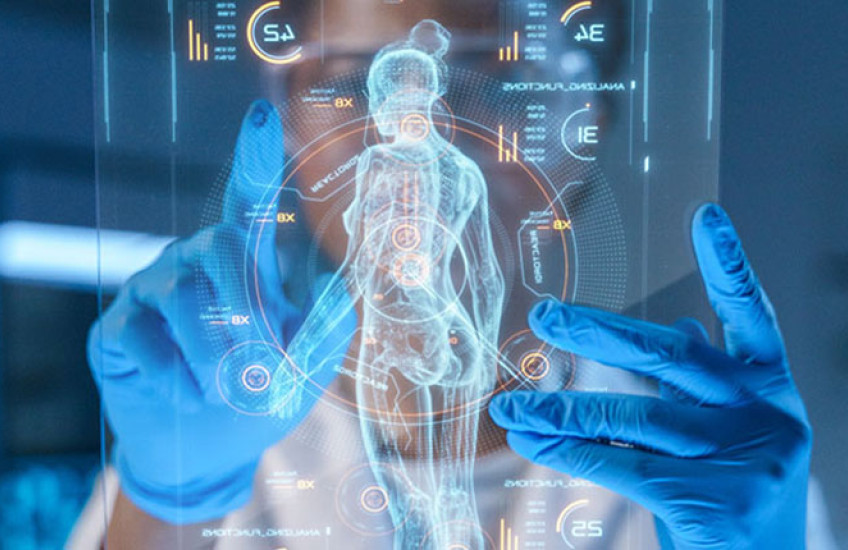 A human physician looking at AI on a tablet