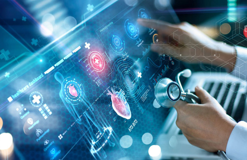 Computer screen and physician hands