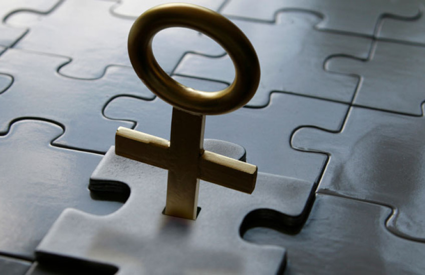 A puzzle piece with a female sign for a handle clicking into a puzzle