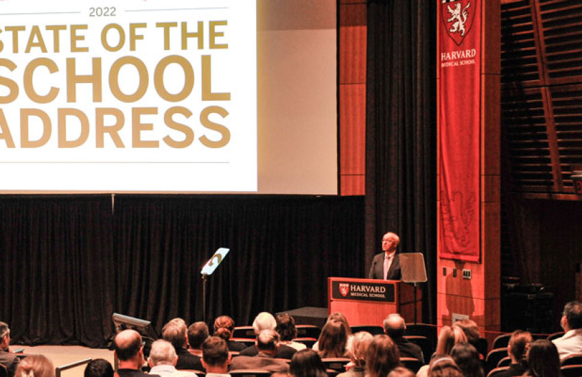 Photo of Daley at podium in Martin amphitheater during speech. 