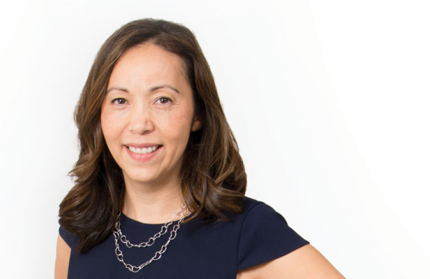 A headshot of Marcia Haigis against a white background
