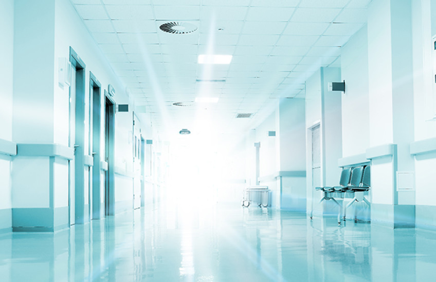 Rays of light in a hospital corridor.