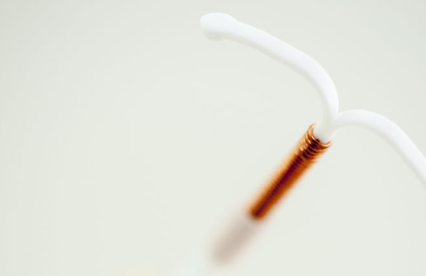 Abstracted close-up of an IUD.
