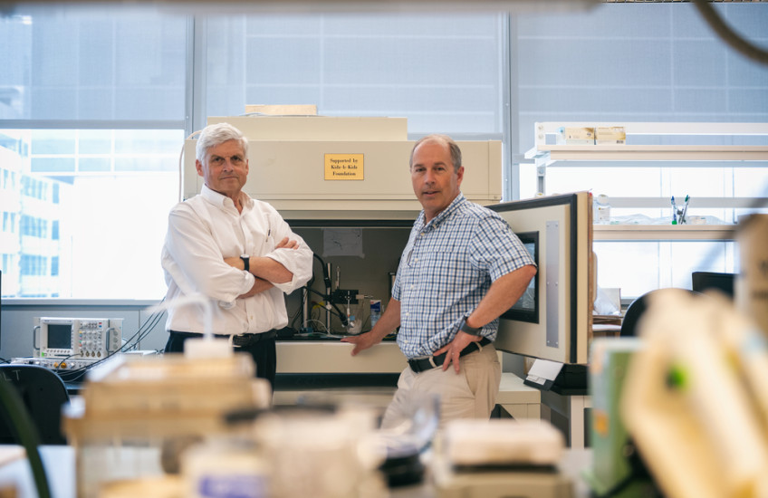 two researchers in the lab