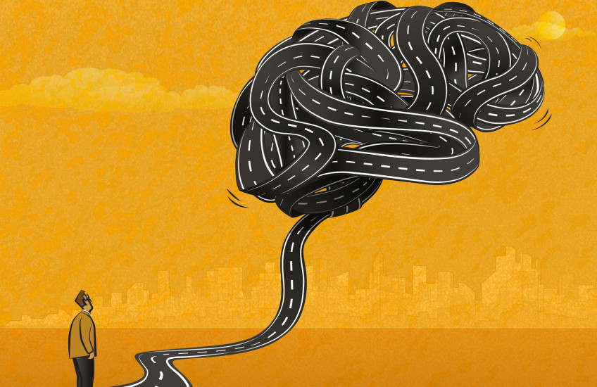 Illustration of a man standing looking at a brain balloon made of tangled black tape that looks like a road, on a gold background