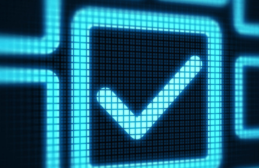 Big blue checkmark against a black background