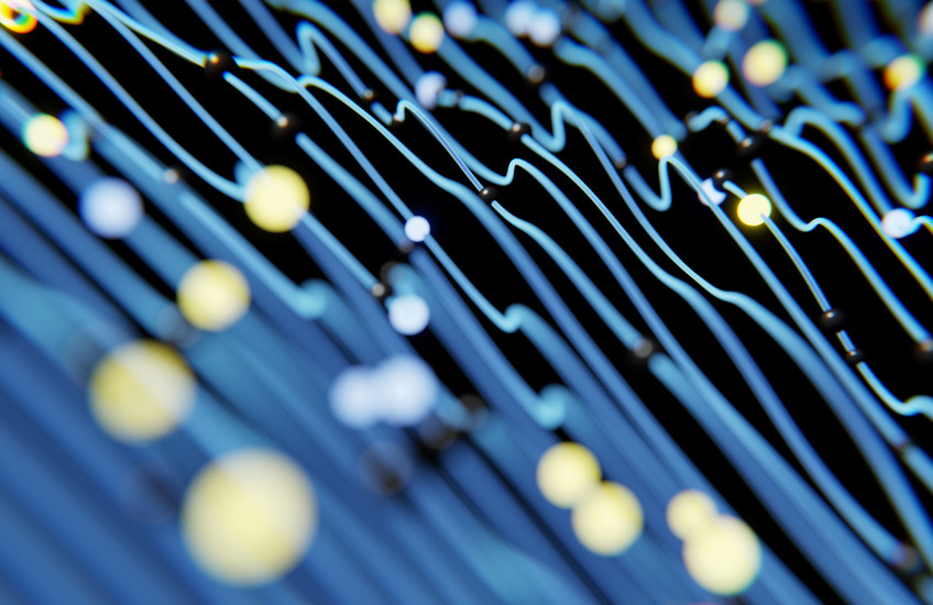 Stylized image of neural connections (blue background, yellow connections) in the brain