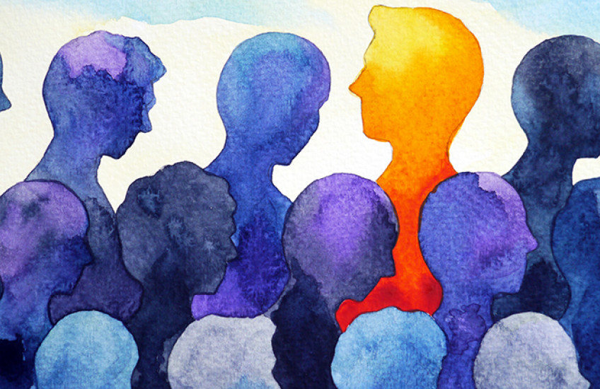 Artistic rendering a person standing out from the crowd