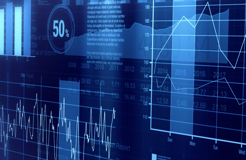 Graphs and charts overlapping onscreen in a digital collage