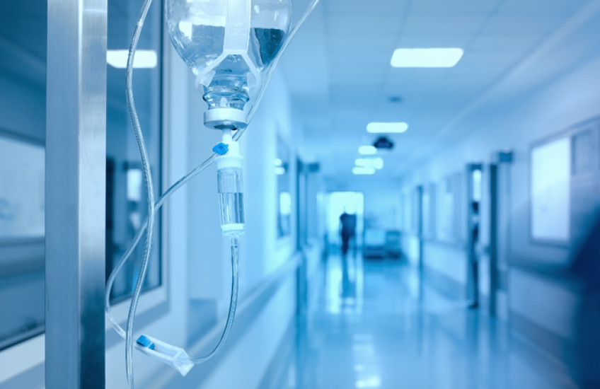 Hospital hallway with IV drip.