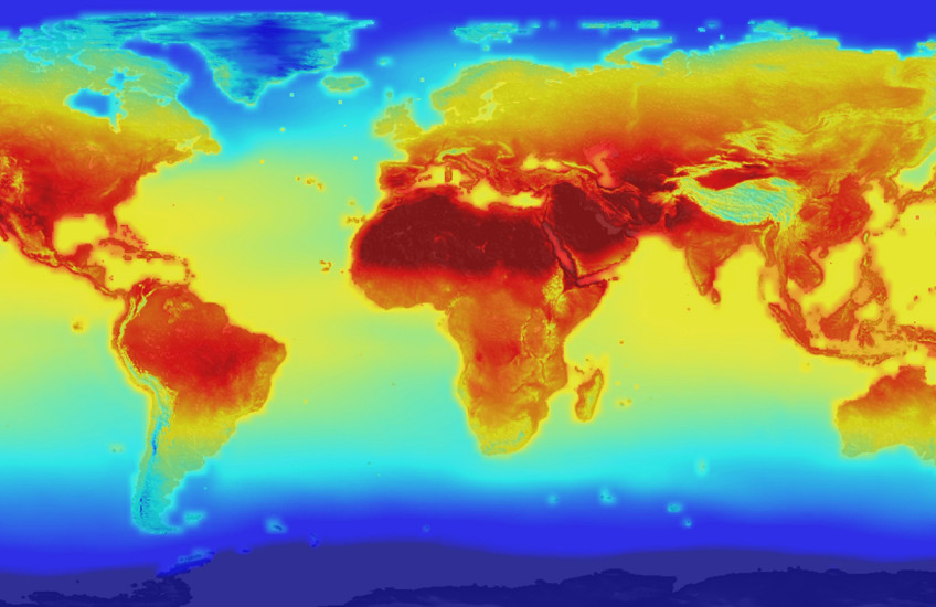 A false color map of the world with red, orange and yellow indicating predicted temperature increases due to greenhouse gases.