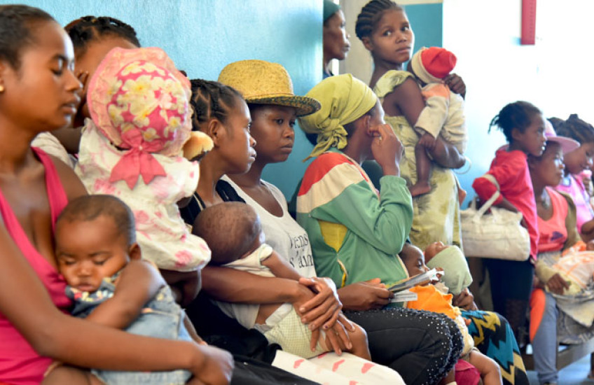 Women and children waiting for vaccinations.