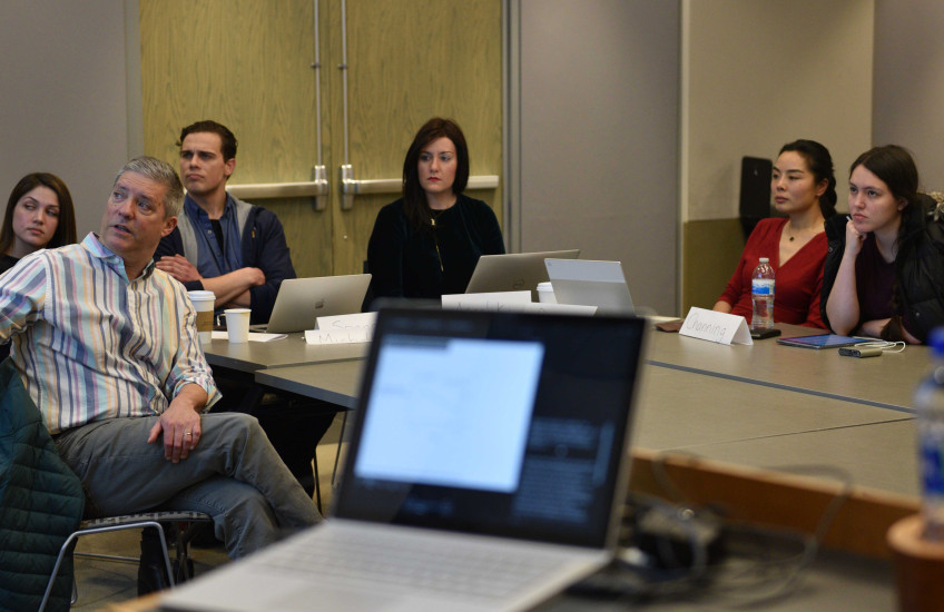Professor Rick Born leads a discussion on data and ethics with members of the class.