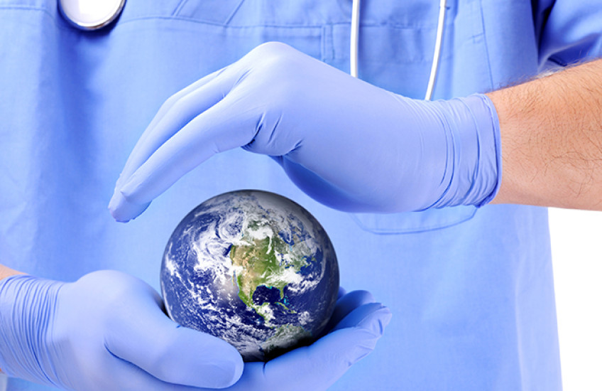 surgeon holding a globe