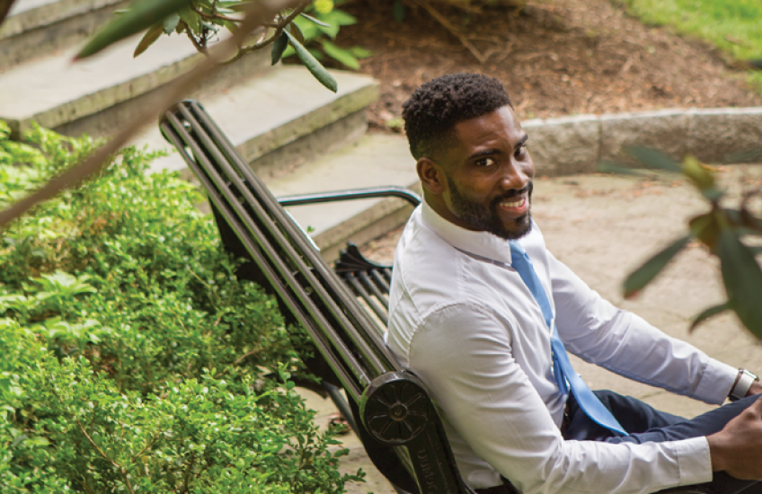 Photo of Nwanaji-Enwerem on a bench in a park