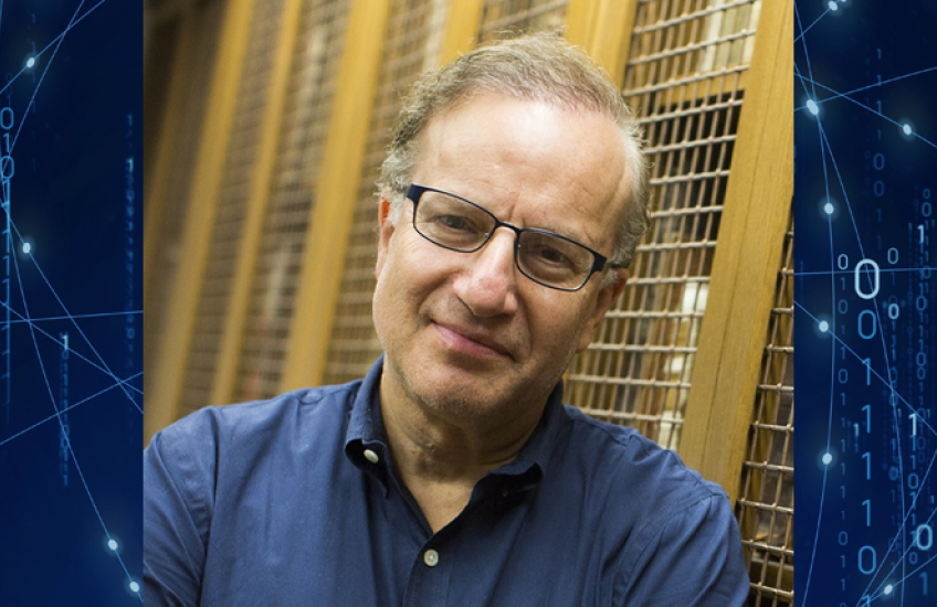 Photo of Isaac Kohane over a blue background