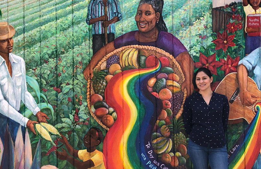 photo of morales temich against mural