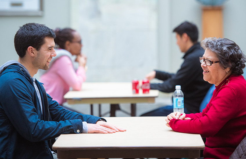 HMS student and tutor practice conversational speaking 