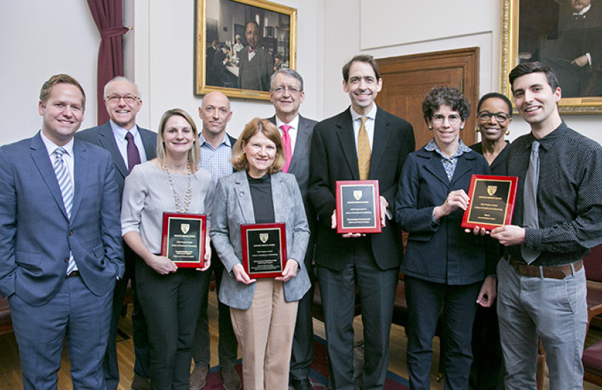 From left to right, front row; Jeffrey Sparks, Stephanie Mueller, Patricia D’Amore, back row; George Daley, Daniel Solomon, David Hunter, Peter Nigrovic, Jennifer Potter, Joan Reede, Jonathan Kusner Photo by Jeff Thiebauth