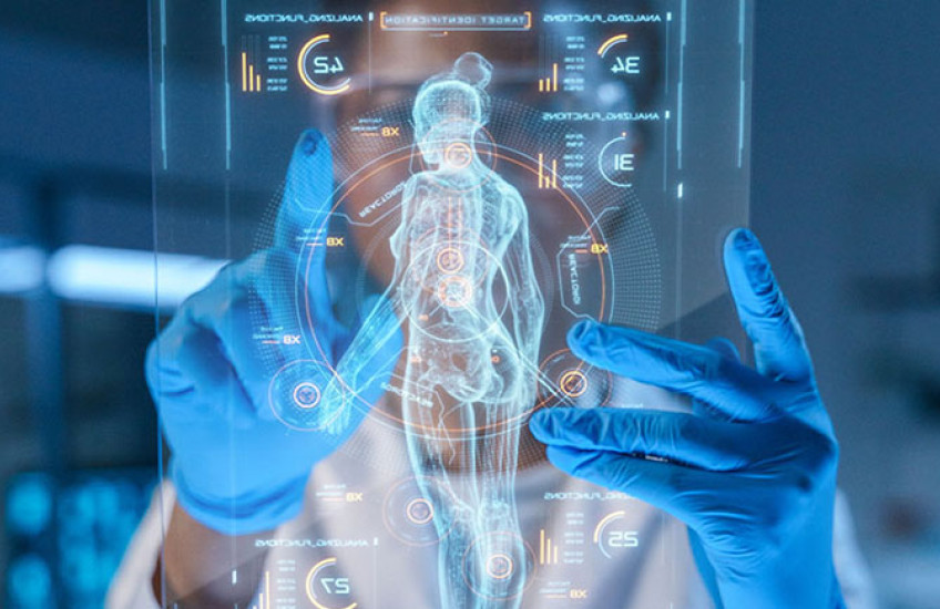 A human physician looking at AI on a tablet