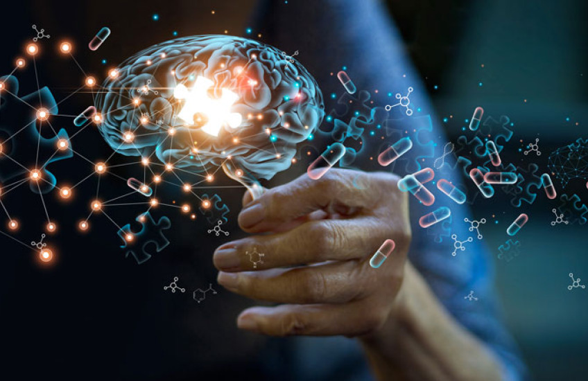 Illustration of an older person's hand holding a holographic image of a brain with an illuminated puzzle piece inside it