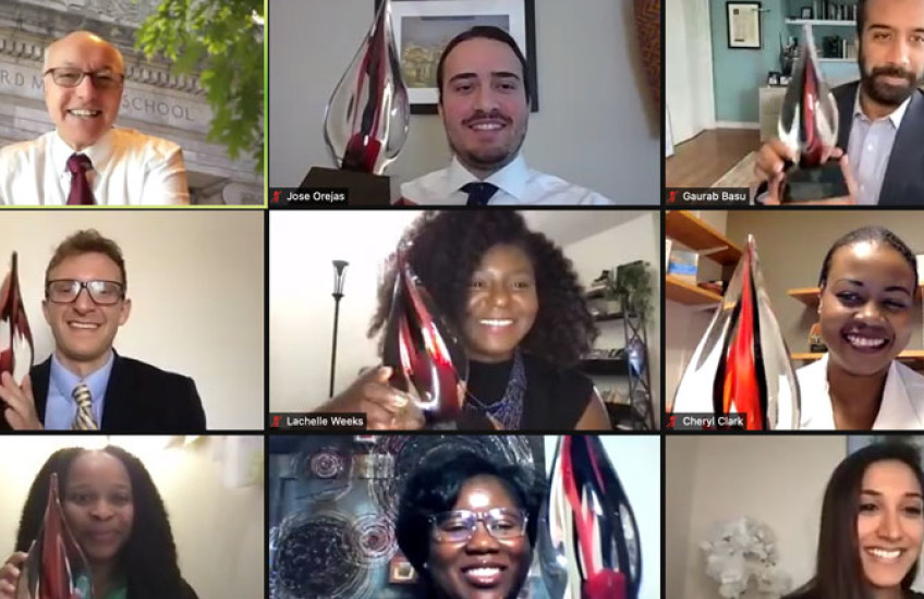Screenshot of the zoom awards ceremony with recipients holding up their awards
