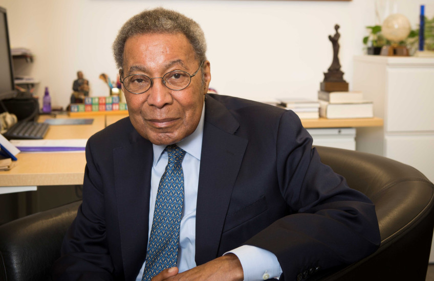 Dr. Alvin Poussaint in his office