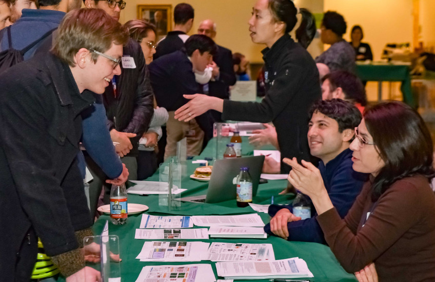 HMS student talking to faculty at C/T fair 