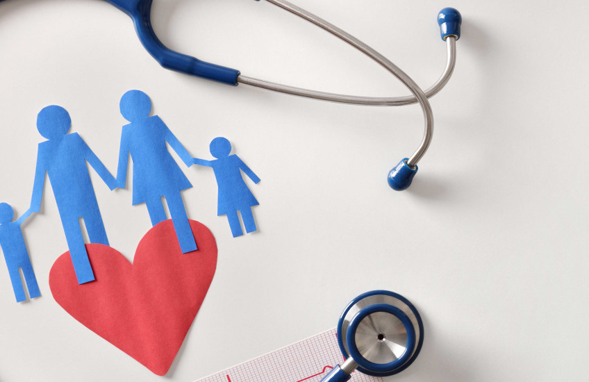 Illustration with stethoscope and paper dolls of family 