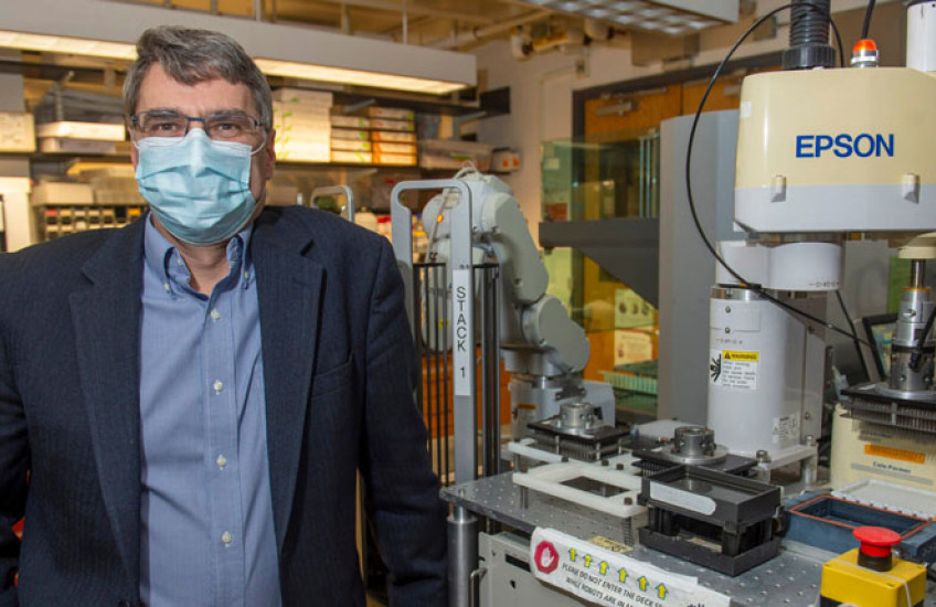 Photo of Mark Namchuk standing in a lab 