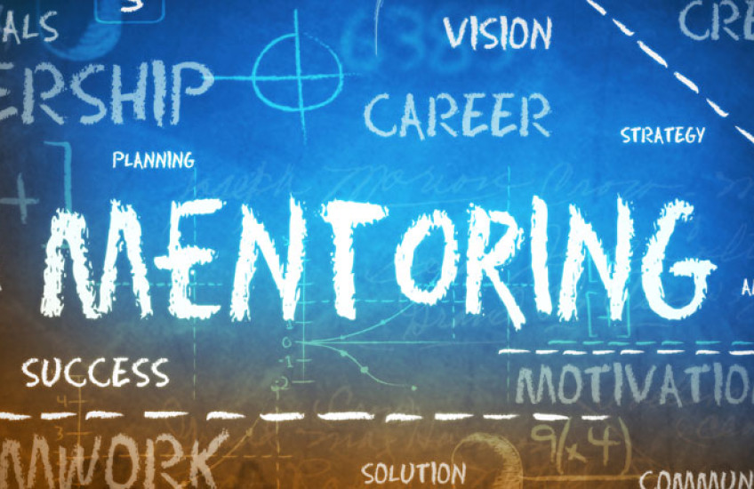 Illustration that says "Mentoring" on a chalk board 