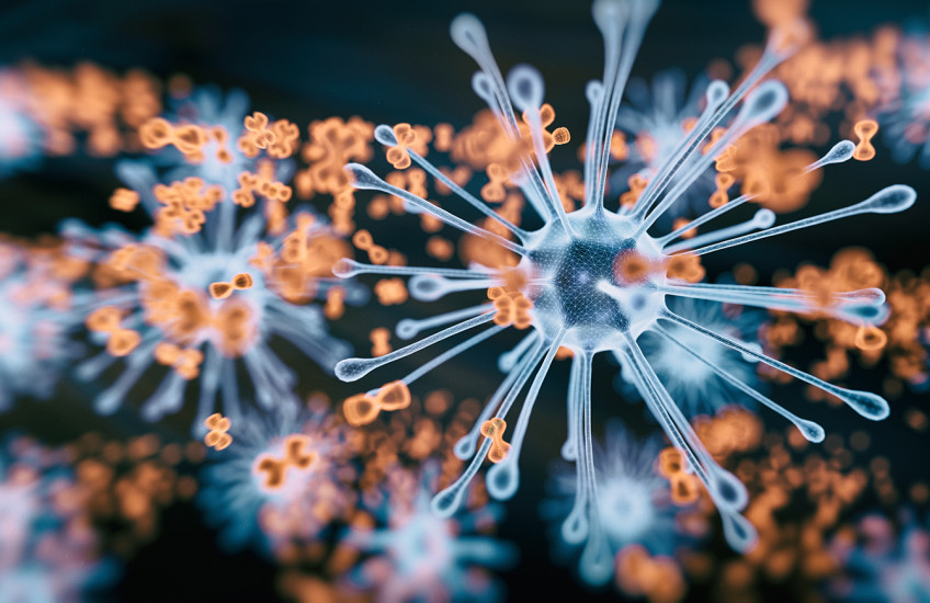 Rendered image of spikey blue virus particle and bow shaped orange antibodies on a black background