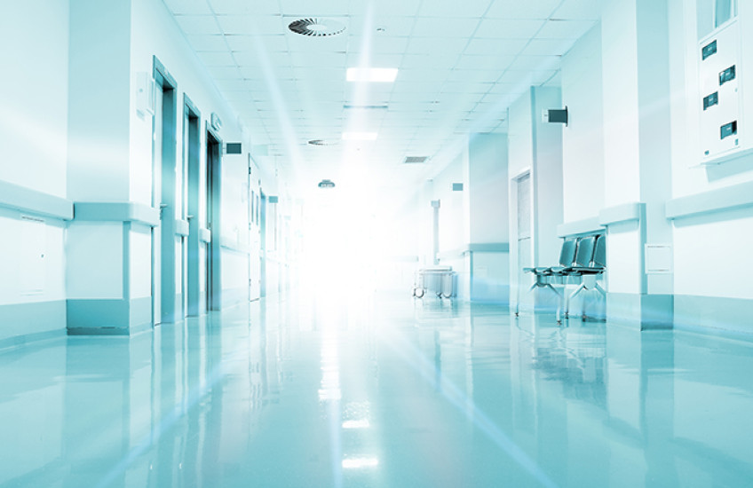 Rays of light in a hospital corridor.