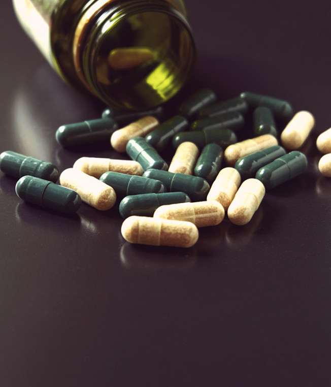 bottle with pills spilling out