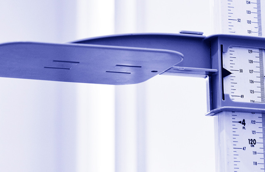 close-up of a stadiometer that measures height