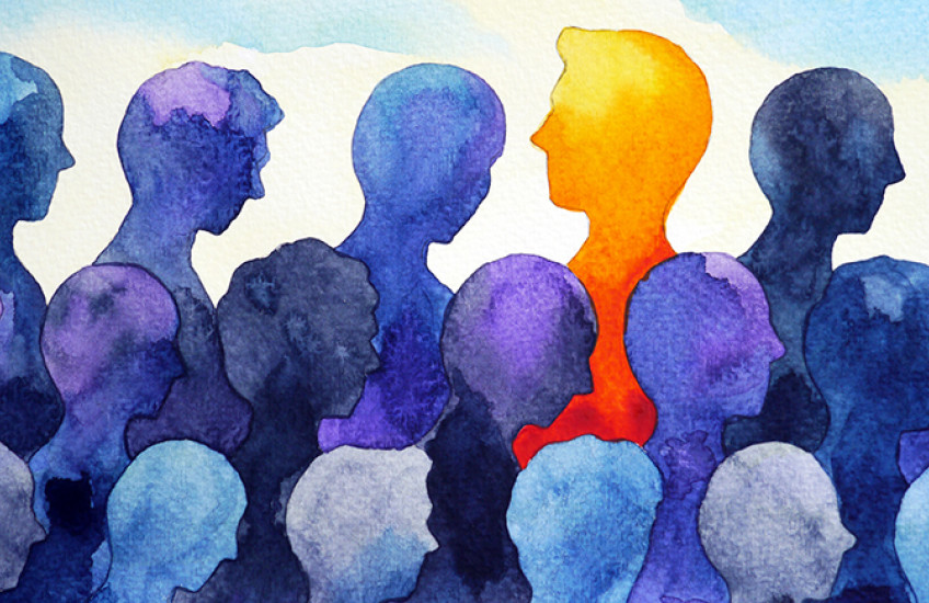 Artistic rendering a person standing out from the crowd