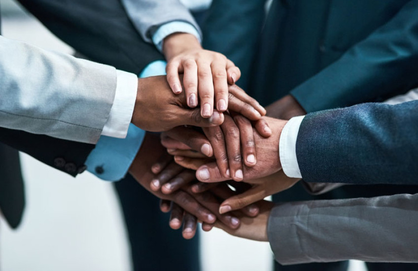 people bring their hands together