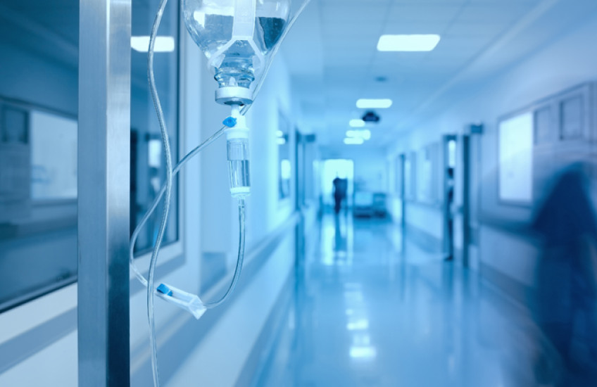 Hospital hallway with IV drip.