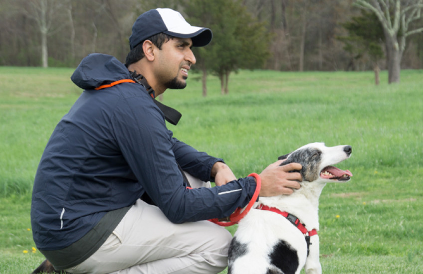 Mangalath with dog Fritz
