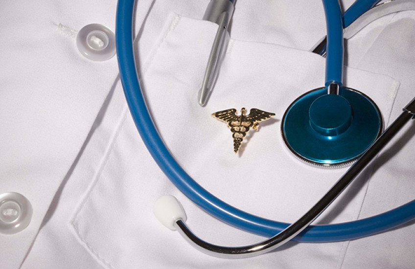 photo of white coat with stethoscope