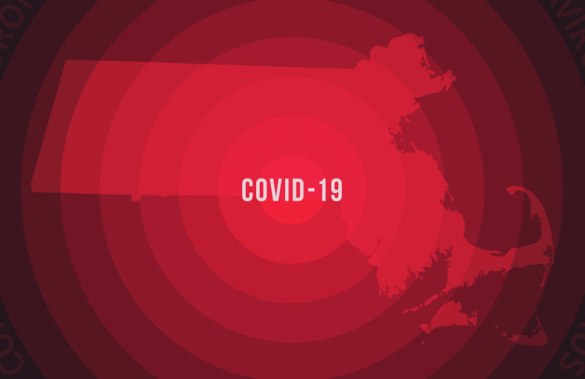 A map of Massachusetts in red labeled COVID-19