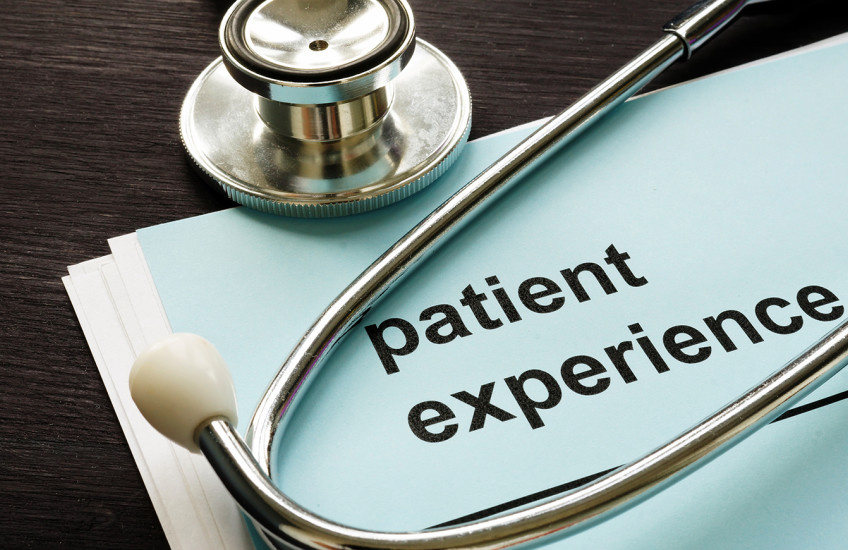 A stethoscope and a patient experience survey