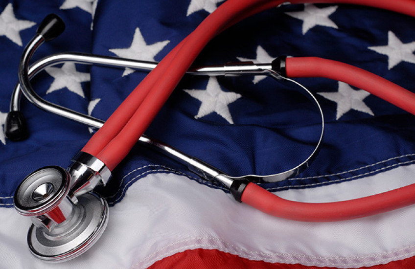 Red stethoscope on American flag