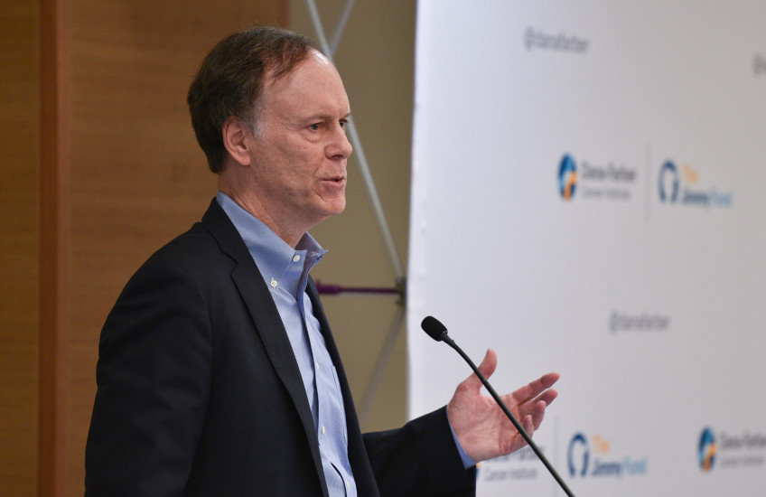 William Kailin stands at a podium