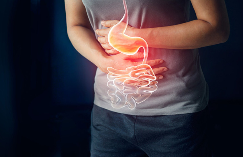 person holding their stomach