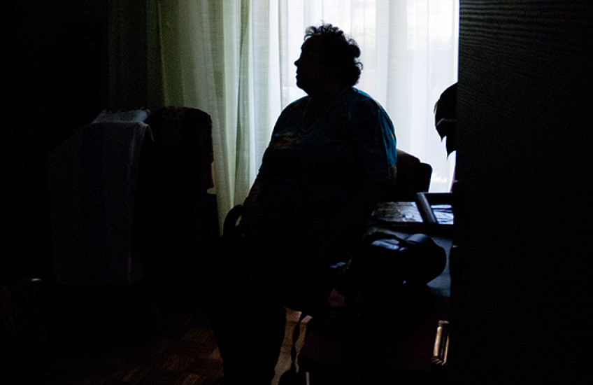 silhouette of elderly person alone